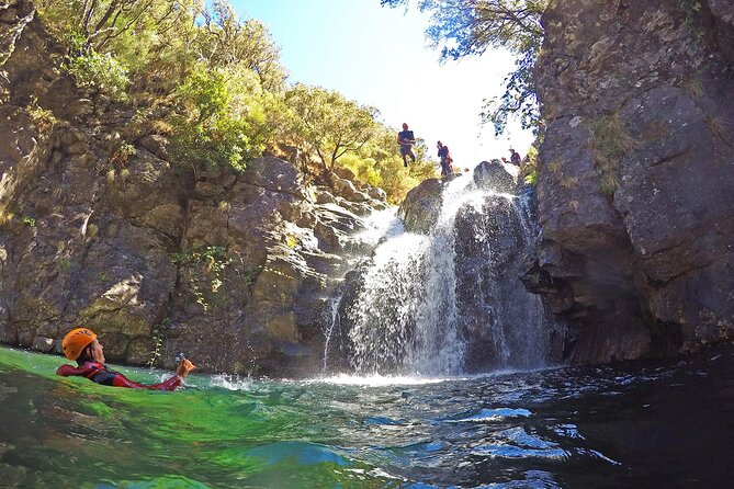 Canyoning Experience Level II Moderate - Gear included: wetsuit, harness, helmet, gloves, boots, and rappel setup