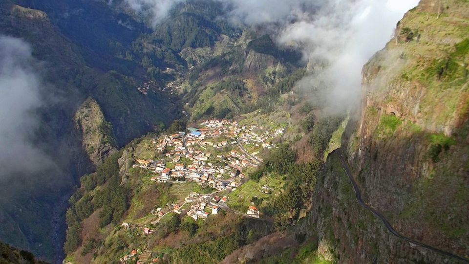 From Funchal: Nuns Valley, Monte and Sleigh Ride Tour - Curral das Freiras (Nuns Valley): Lava Rock, Pirate Fears, and Liquor Tasting
