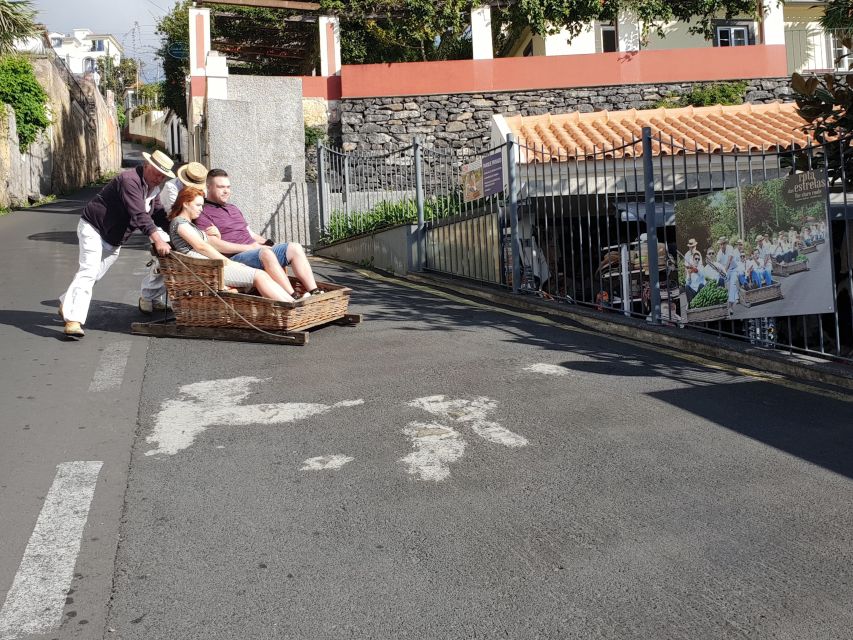 Funchal: Monte Toboggan and Old Town Tour by Tuk-Tuk - The climb to Monte: views at about 585 meters