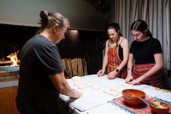 Hands-On Bolo do Caco Baking Class with a Madeiran Family - Rolling, kneading, and shaping by hand