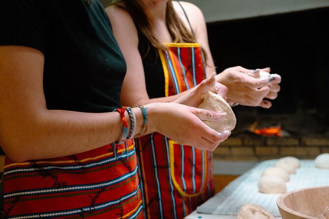 Hands-On Bolo do Caco Baking Class with a Madeiran Family - The hot-stone baking step (where it smells like home)